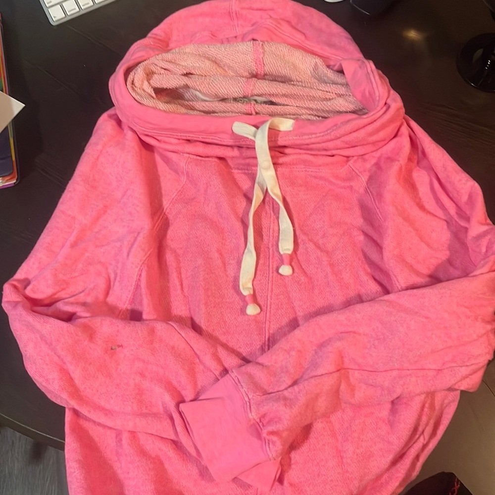 SO brand pink hoodie.